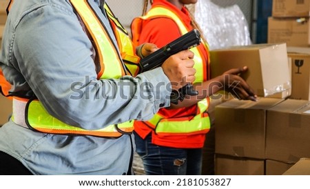 People working in product distribution logistics center, Warehouse worker scanning retail drop-shipping package parcel boxes preparing ship order to customers, Logistic and business export concept
