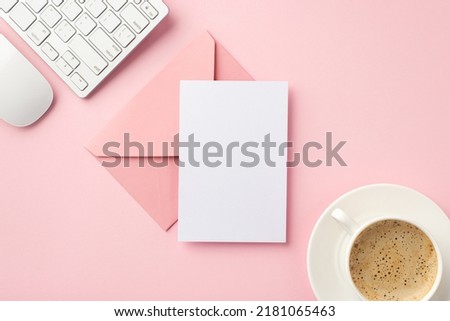 Business concept. Top view photo of workstation keyboard computer mouse cup of coffee on saucer pink envelope and paper sheet on isolated pastel pink background with copyspace