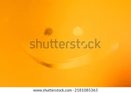 Mirror funny smiling face in bathroom