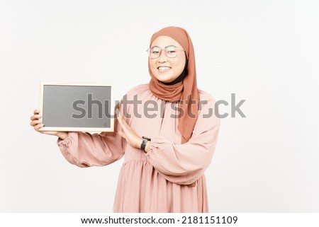 Showing, Presenting and holding Blank Blackboard of Beautiful Asian Woman Wearing Hijab Isolated On White Background