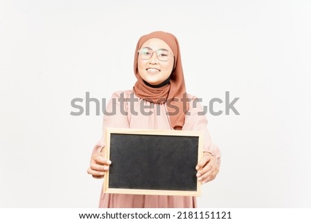 Showing, Presenting and holding Blank Blackboard of Beautiful Asian Woman Wearing Hijab Isolated On White Background