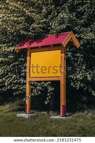 information board in the forest with space for your text 