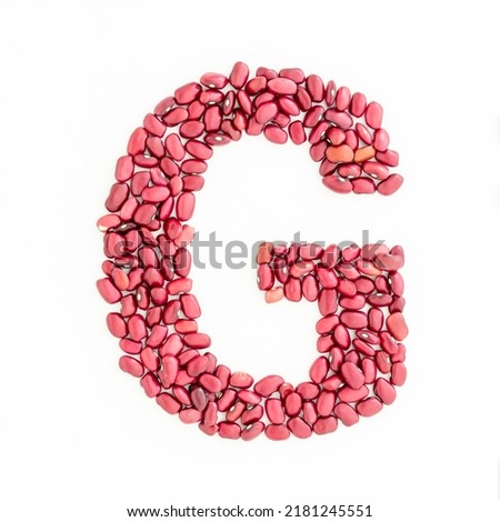 Capital letter G from red kidney beans. Beans font. White background. Bright font for menu or food blog. Lettering design element. Initial cap