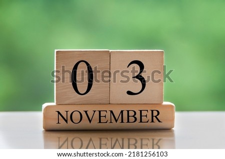 November 3 calendar date text on wooden blocks with copy space for ideas or text. Copy space and calendar concept