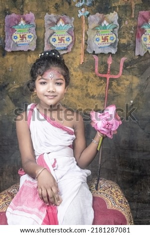 Portrait of a beautiful Indian beautiful teen girl in traditional clothing and accessories 