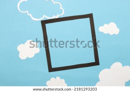 black frame in the sky in the clouds as copy space, clear air, blue sky, copy space creative art modern design