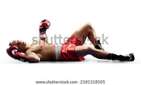 Professioal boxer knocked out by hard box knockout isolated on white background