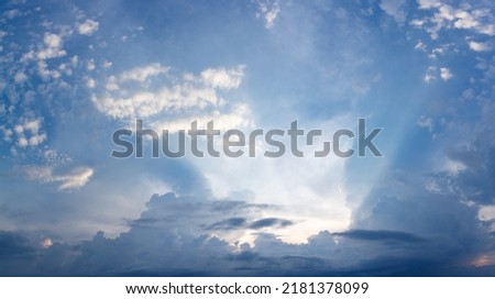 Dramatic evening sky with sun rays. High resolution panoramic image