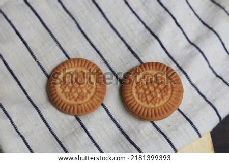Two cream biscuit isolated,Fresh food sweet cookies biscuit a background.