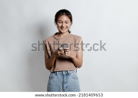 Beautiful Asian woman gesturing for advertisement editing on isolated background, portrait concept used for advertisement and signage, isolated over white background, copy space.