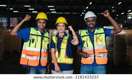 Group Portrait of the worker in the warehouse., Industrial and industrial concept.