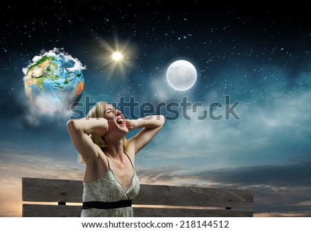 Young woman sitting on bench closing ears with palms and screaming. Elements of this image are furnished by NASA