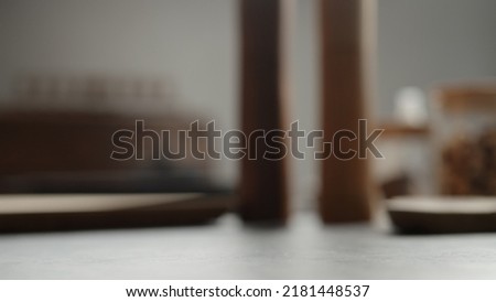Closeup countertop with utensils on background