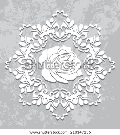 Ornamental element on the abstract gray background. Vector