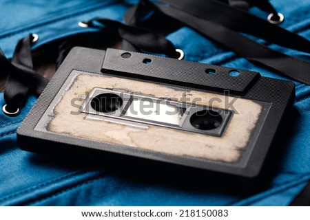 audio cassette on blue corset