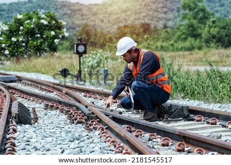 engineer Sitting on railway inspection. construction worker on railways. Engineer work on railway.rail,engineer,Infrastructure Royalty-Free Stock Photo #2181545517