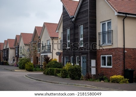 Typical English new build contemporary housing development Royalty-Free Stock Photo #2181580049