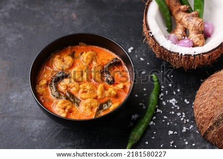 Shrimp masala fish curry Chemmeen curry in coconut milk tiger Prawns balchao Curry. Spicy Kerala fish curry Indian seafood non veg food side dish rice appam Goan Tamil Nadu Bengal Sri Lankan Royalty-Free Stock Photo #2181580227