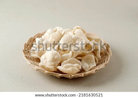 Selected Focus Krupuk Upil or Krupuk Mlarat, Indonesian Popular Cracker made from Cassava Flour and Fried without Oil. Mlarat Means Poor because Have no Oil to Cook