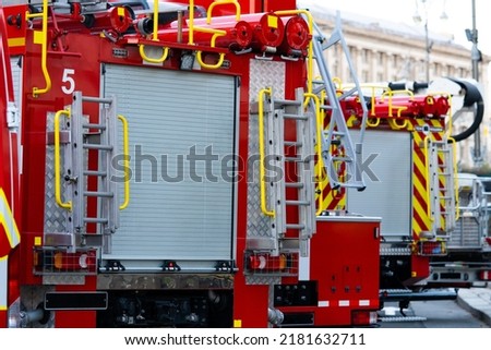 Red fire truck. Fire-technical transport. Fire trucks are preparing to put out the fire.