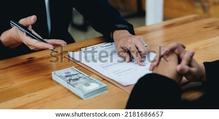 people sign contract to borrow money from investor to invest at own business. loan mortgage finance concept. Royalty-Free Stock Photo #2181686657