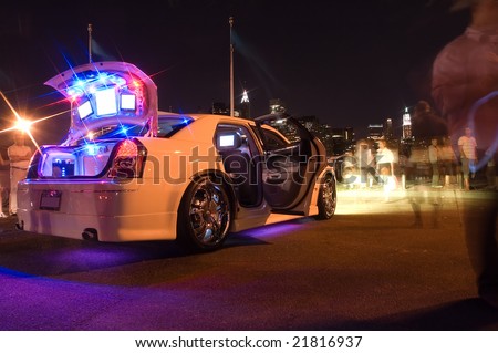 modified white car with several lights and LCD displays Royalty-Free Stock Photo #21816937