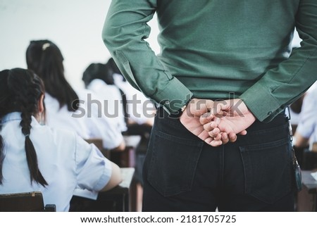 The teacher controls the exam room for students to take the exam in the classroom Royalty-Free Stock Photo #2181705725