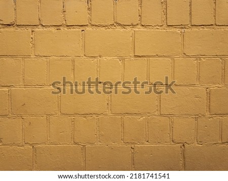 Abstract yellow color brick wall texture for background. Textured Background Illustration. Abstract weathered texture stained old stucco yellow color brick and aged paint yellow color brick