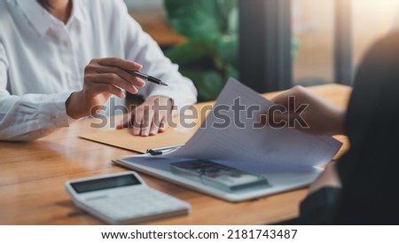 Attorney or officers are taking bribes from clients in a bribery courtroom to gain an advantage in a lawsuit. Royalty-Free Stock Photo #2181743487