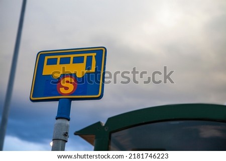 Bus stop sign in Reykjavik, Iceland. Modern public transport. Bus stop in the city street. Bus station. Traffic signs.