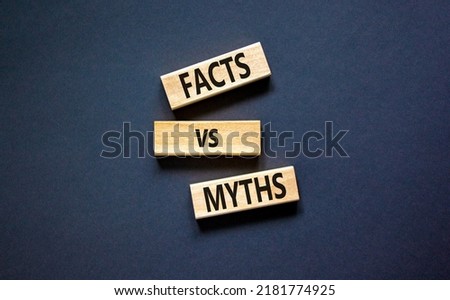 Facts vs myths symbol. Concept words Facts vs myths on wooden blocks on a beautiful black table black background. Business, finacial and facts vs myths concept. Copy space. Royalty-Free Stock Photo #2181774925