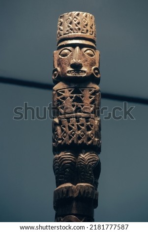 Pre-Columbian representation of the god Pachacamac made of carved wood Lima - PERU Royalty-Free Stock Photo #2181777587