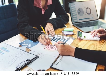 portrait of an Asian businesswoman who is starting to plan a marketing campaign to reach her target audience Royalty-Free Stock Photo #2181843349