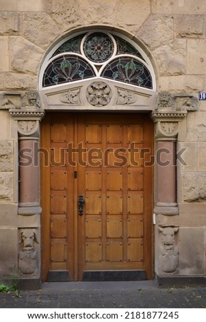 wooden door in an old limestone building