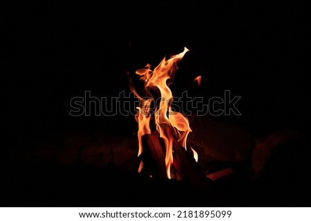 High contrast fire and black background