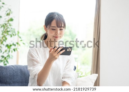 Asian young woman using a smartphone