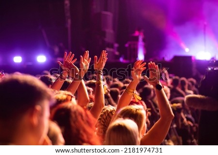  crowd partying stage lights live concert summer music festival Royalty-Free Stock Photo #2181974731