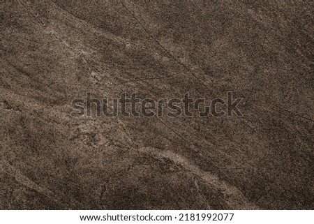 Simple flat dark sand texture. Sand background. High quality photo. Wallpaper template design for decoration.