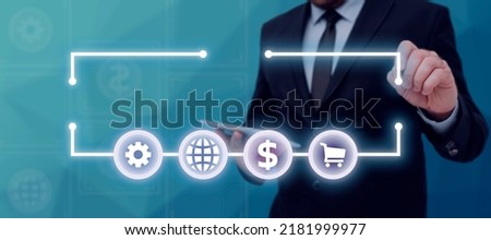 Businessman Holding Tablet And Pointing On Frame With Symbols And Important Message In. Man In Suit Having Cellphone In Hand And Presenting New Ideas In Framework.