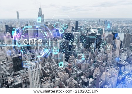 Aerial panoramic city view, Upper Manhattan area, the East Side, river and Brooklyn on horizon, New York city, USA. GDPR hologram, concept of data protection regulation and privacy for all individuals