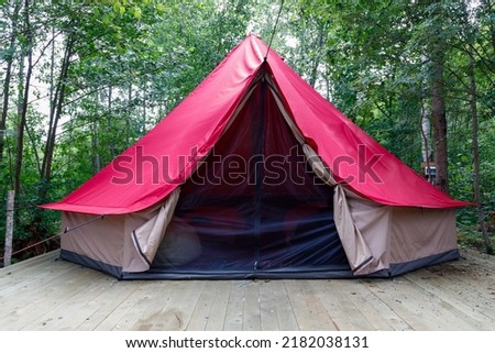 Photo of glamping in the forest in summer