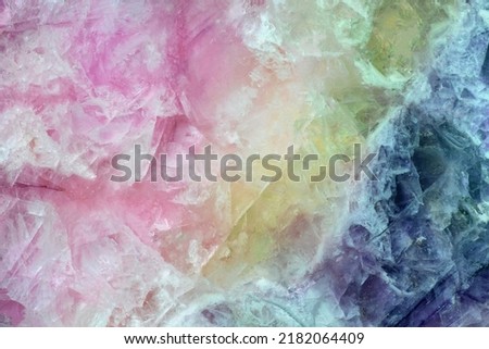 pink, yellow and blue fluorite texture macro photo Royalty-Free Stock Photo #2182064409