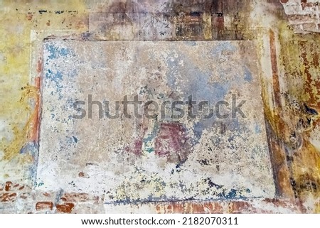 pictures on the wall of an abandoned temple, the temple of the village of Stolpino, Kostroma region, Russia, built in 1758, currently the temple is abandoned