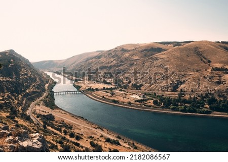 Euphrates river valley and bridge over Euphrates near Ataturk Dam. Sanliurfa province, Turkiye Royalty-Free Stock Photo #2182086567