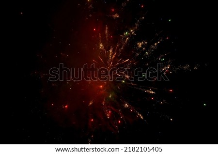 Colorful fireworks lights in the sky Royalty-Free Stock Photo #2182105405