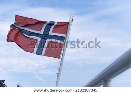 Norway national flag in the sky.