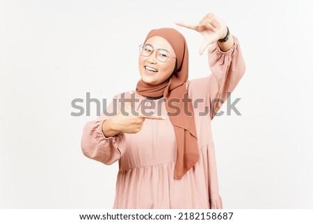 Make Frame With Hands of Beautiful Asian Woman Wearing Hijab Isolated On White Background