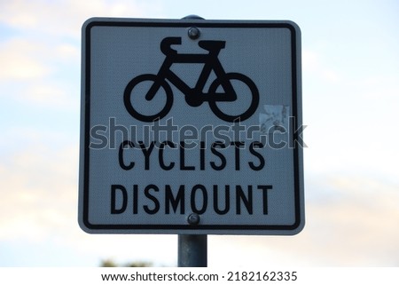 Sign on a bike path in Noosaville, Sunshine Coast, Queensland, Australia.