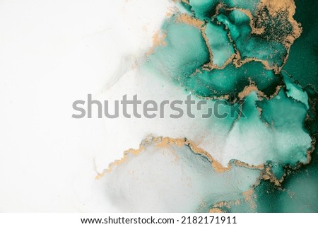 Marble ink abstract art from exquisite original painting for abstract background . Painting was painted on high quality paper texture to create smooth marble background pattern of ombre alcohol ink . Royalty-Free Stock Photo #2182171911