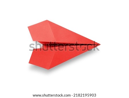 Red paper plane origami isolated on a blank white background